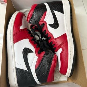 Air Jordan 11 Retro BG sneakers.